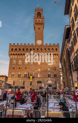 People at a restaurant in front of the Palazzo Vecchio town hall, Piazza della Signoria, Florence, Tuscany, Italy, Europe Stock Photo