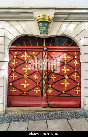 Entrance door with real gold leaf fittings from 1727, baroque house, Neißstraße, Goerlitz, Upper Lusatia, Saxony, Germany Stock Photo