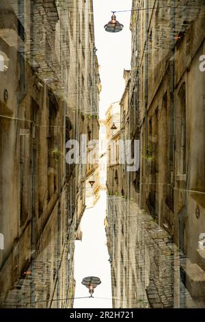 A narrow street downtown Bordeaux. Stock Photo