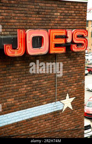 JOE'S sign on a red brick wall in Nashville, Tennessee. Stock Photo