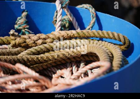Bucket full of fishing ropes used by fishermen Stock Photo