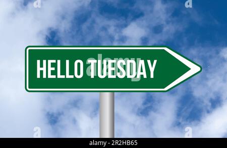 Hello tuesday road sign on blue sky background Stock Photo - Alamy