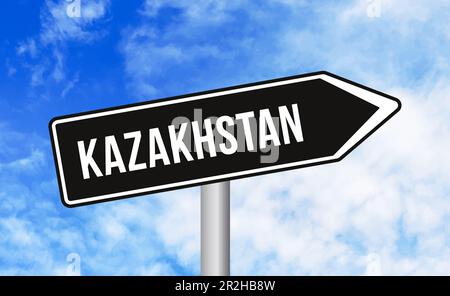 Kazakhstan road sign on cloudy sky background Stock Photo