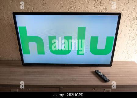 Brazil, Rio de Janeiro - May 19, 2023: Flat-screen TV set displaying logo of Hulu, a U.S.-based subscription video on demand service. Stock Photo