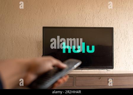 Brazil, Rio de Janeiro - May 19, 2023: Flat-screen TV set displaying logo of Hulu, a U.S.-based subscription video on demand service. Stock Photo