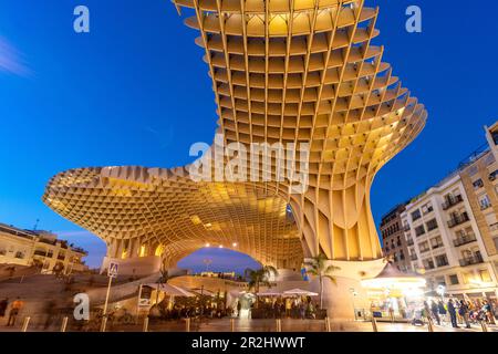 The futuristic wooden structure and observation deck Metropol Parasol in Plaza de la Encarnación at dusk, Seville, Andalusia, Spain Stock Photo