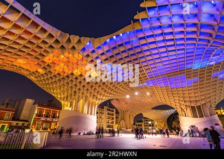 The futuristic wooden structure and observation deck Metropol Parasol in Plaza de la Encarnación at dusk, Seville, Andalusia, Spain Stock Photo