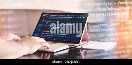Programmer working on computer code, developer of software applications Stock Photo