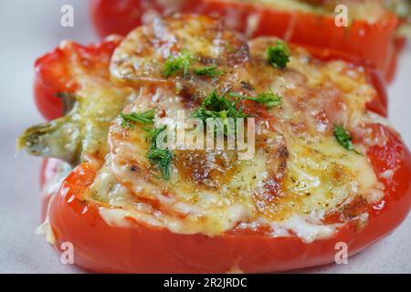 Bell peppers stuffed with ground beef and cheese Stock Photo