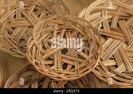 Piring Lidi, Woven Plate Made from Coconut Leaf Stick. Indonesian Traditional Plate Made from Biodegradable Nature Material. Go Green Concept Stock Photo