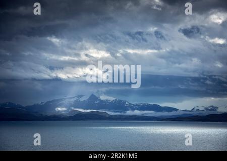 Glacier and lake in dramatic lighting, Patagonia, Chile, South America Stock Photo