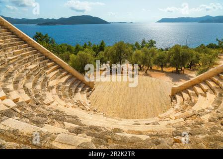 The Theatre of Antiphellos Ancient City in Kas town, Antalya region, Turkey with Mediterranean sea in sunny day. Popular landmark and travel destinati Stock Photo