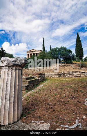 Remote view of the temple of Hephaestus in Ancient Agora, Athens, Greece. The Temple of Hephaestus is the best preserved ancient temple in Greece. It Stock Photo