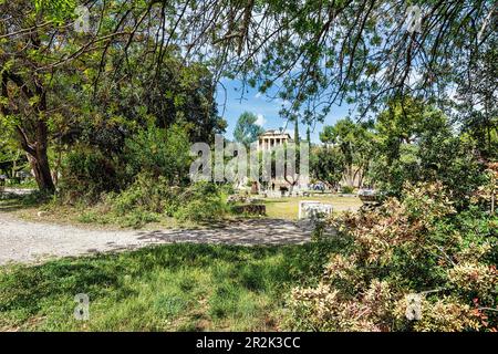 Remote view of the temple of Hephaestus in Ancient Agora, Athens, Greece. The Temple of Hephaestus is the best preserved ancient temple in Greece. It Stock Photo