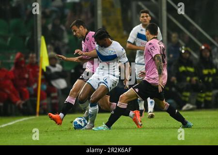 Brescia’s Florian Aye defending ball against Palermo’s Davide Bettella during the Italian Serie BKT soccer match Palermo FC vs. Brescia at the Renzo B Stock Photo