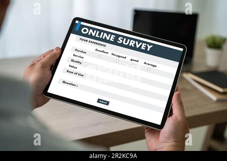 woman person use computer feedback survey online business experience choice customer information to check review form on display Stock Photo