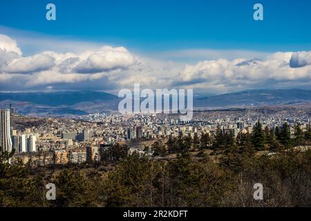 Spring view to Tbilisi city with blue sky and white clouds Stock Photo