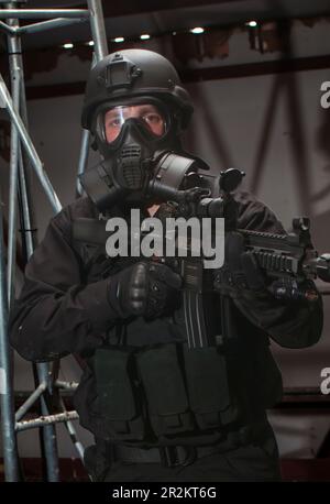 An airsoft player in the role of a British Special Forces soldier from the SAS in Counter Terrorist Warfare Stock Photo