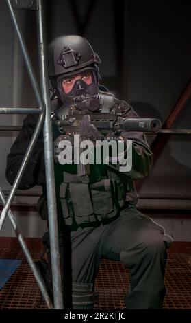 An airsoft player in the role of a British Special Forces soldier from the SAS in Counter Terrorist Warfare Stock Photo