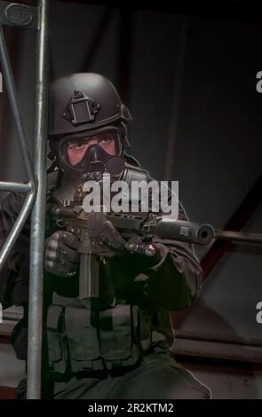 An airsoft player in the role of a British Special Forces soldier from the SAS in Counter Terrorist Warfare Stock Photo