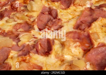 05.04.2023. vienna, austria. detail views hawaii pizza pic and tomato sauce, cheese, ham, pineapple Stock Photo