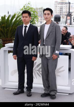 Cannes, France. 20th May, 2023. Chinese director Wei Shujun (L) and actor Zhu Yilong pose during a photocall for the film 'He Bian De Cuo Wu' (Only the River Flows) in competition for the category Un Certain Regard at the 76th edition of the Cannes Film Festival in Cannes, southern France, on May 20, 2023. Credit: Gao Jing/Xinhua/Alamy Live News Stock Photo