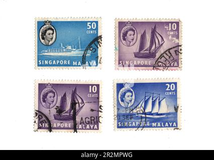 Vintage postage stamps from Trinidad and Tobago isolated on a white ...
