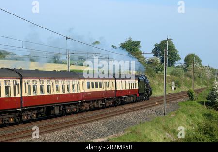 Steam loco black 5 45231 The Sherwood Forester hauling The Lakelander special train past Bay Horse, Lancashire on West Coast Main Line, 20th May 2023. Stock Photo