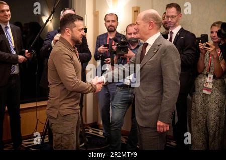 President of the Ukraine Zelensky meets with German Chancellor Olaf Scholz as Zelensky arrives in Japan to make a presentation to the world leaders attending the G7 Summit. Stock Photo