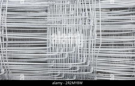 Mesh wire bundle abstract background, selective focus. Stock Photo