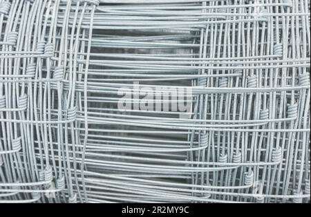 Mesh wire bundle abstract background, selective focus. Stock Photo