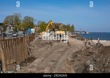 Soil removal on construction site at Kalaranna 8. New residential Kalarand district by the sea in Tallinn, Estonia. Stock Photo