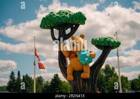 WHITE RIVER, ONTARIO, CANADA - MAY 2023 View of Winnie the Pooh statue in the town of White River. High quality photo Stock Photo