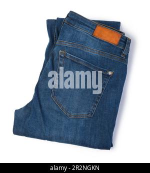 Blue jeans folded on white background Stock Photo