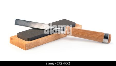 chisel and whetstones on white background Stock Photo