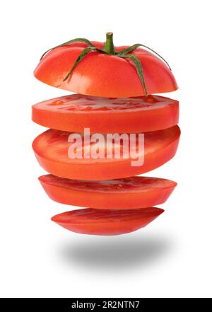 Flying tomato Sliced red apple isolated on white background Stock Photo