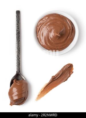 bowl and spoon with chocolate spread on white background isolated Stock Photo