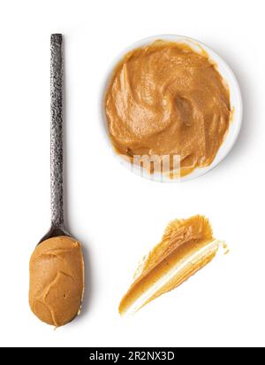 Premium Photo  Spoon with peanut butter isolated on white background
