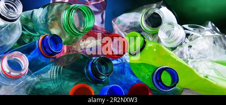 Empty colored carbonated drink bottles. Plastic waste Stock Photo