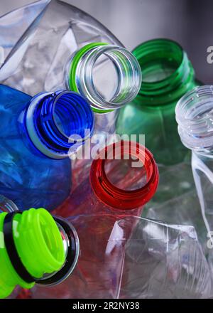 Empty colored carbonated drink bottles. Plastic waste Stock Photo