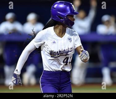 May 19, 2023: Washington outfielder Madison Huskey (9) shows bunt during  the NCAA regional softball game between the N. Colorado Bears and Washington  Huskies at Husky Softball Stadium in Seattle, WA. Washington