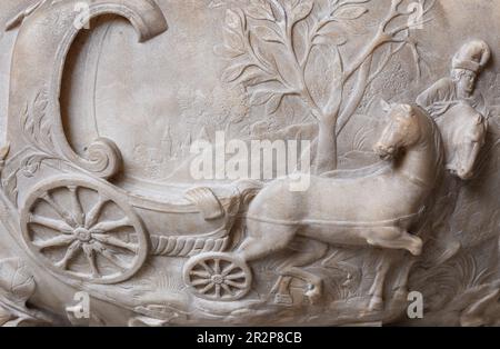 Detail of carving on the font designed by Grinling Gibbons where William Blake was christened, in  St James Church, Piccadilly Stock Photo