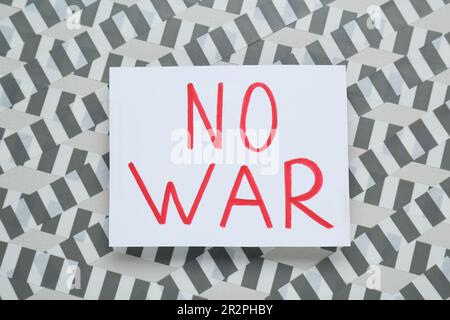 Card with phrase No War and adhesive tape on light background, top view Stock Photo