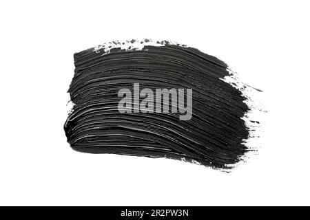 Brushstrokes of black oil paint on white background, top view Stock Photo