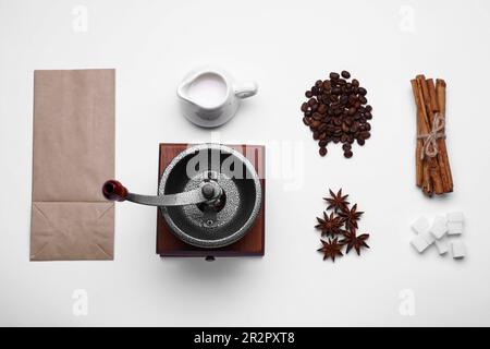 https://l450v.alamy.com/450v/2r2pxt8/flat-lay-composition-with-vintage-manual-coffee-grinder-on-white-background-2r2pxt8.jpg