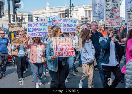 London, UK. 20th May, 2023. Protesters march with placards expressing their opinion during the demonstration. Family members, parents, and health professionals gathered at Trafalgar Square. They marched to Parliament Square in London to put pressure on the British Government to increase the funding of the treatments and make shorter waiting lists. Credit: SOPA Images Limited/Alamy Live News Stock Photo