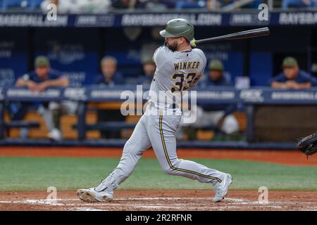 Milwaukee Brewers' Jesse Winker (33) his a RBI single during the