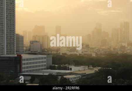 Metro Manila polluted, air pollution seen from Makati city, buildings in the smog & haze due to road traffic jams, fumes, Philippines, Southeast Asia, Stock Photo