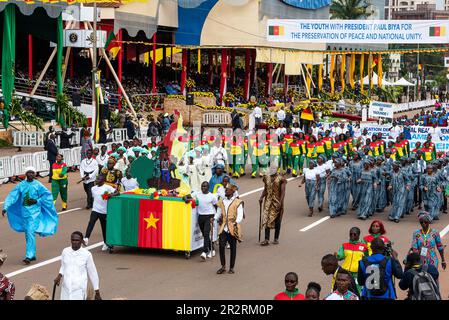 Yaounde. 20th May, 2023. This photo taken on May 20, 2023 shows a square of Cameroonian cultural diversity marching during the National Day celebration in Yaounde, Cameroon. Cameroon marked on Saturday the 51st anniversary of its National Day with a military and civilian parade in Yaounde. Credit: Kepseu/Xinhua/Alamy Live News Stock Photo