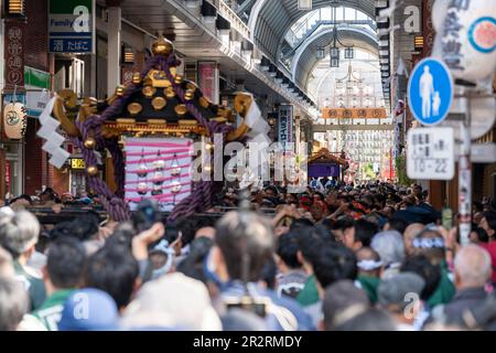 General view, Asakusa Sanja Matsuri is an annual festival which takes place every year on the third weekend of May in the Asakusa district of Tokyo, Japan. This years Sanja Matsuri is held from May 19 to 21, 2023. This festival is known as one of the Three Great Shinto Festivals in Tokyo. Other two Great Shinto Festivals areKandaandSannoMatsuri. Mainly, Sanja Matsuri celebrates the founding of Senso-ji Temple. During the festival, visitors can witness energetic processions, featuring colorful portable shrines called mikoshi, traditional music, and lively performances. Asakusa Sanja Matsuri is Stock Photo